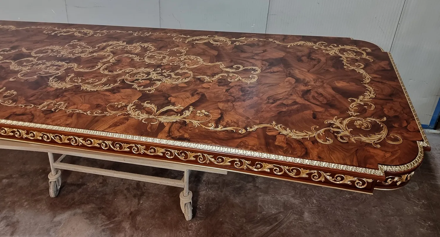 "Inlaid and elaborately crafted table for refined environments."